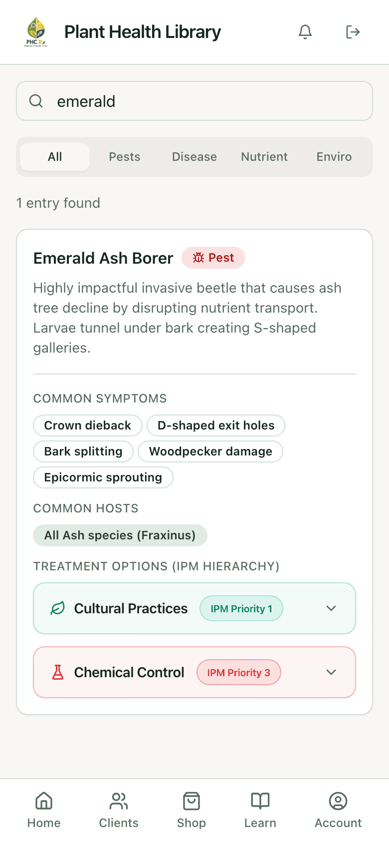 Plant health library entry for emerald ash borer with symptoms, hosts, and IPM treatment tiers